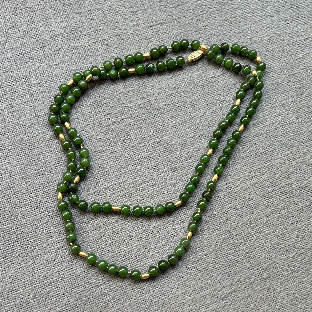 Jade and gold bead strand necklace